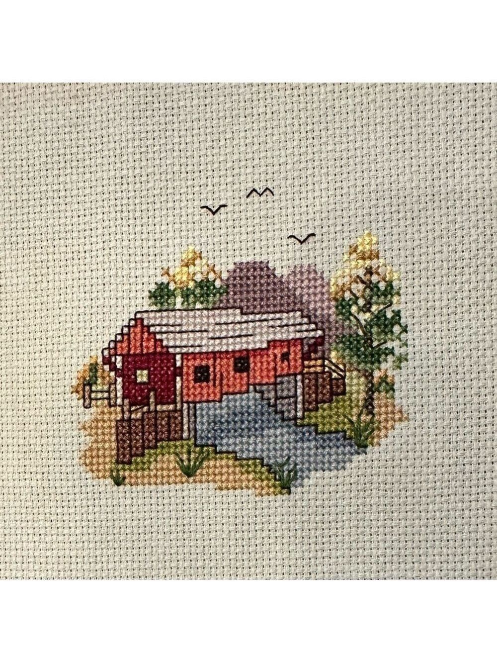 Counted Cross-Stitch completed 8”x12” panel of a Covered Bridge